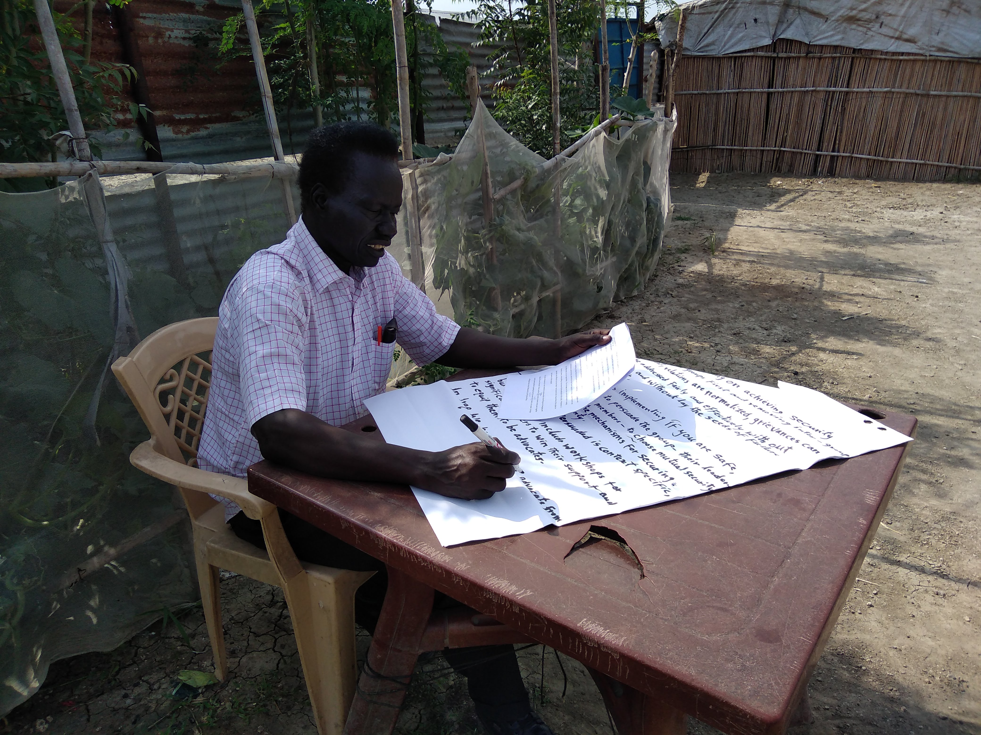 Michael Gwang working through the framework in the field